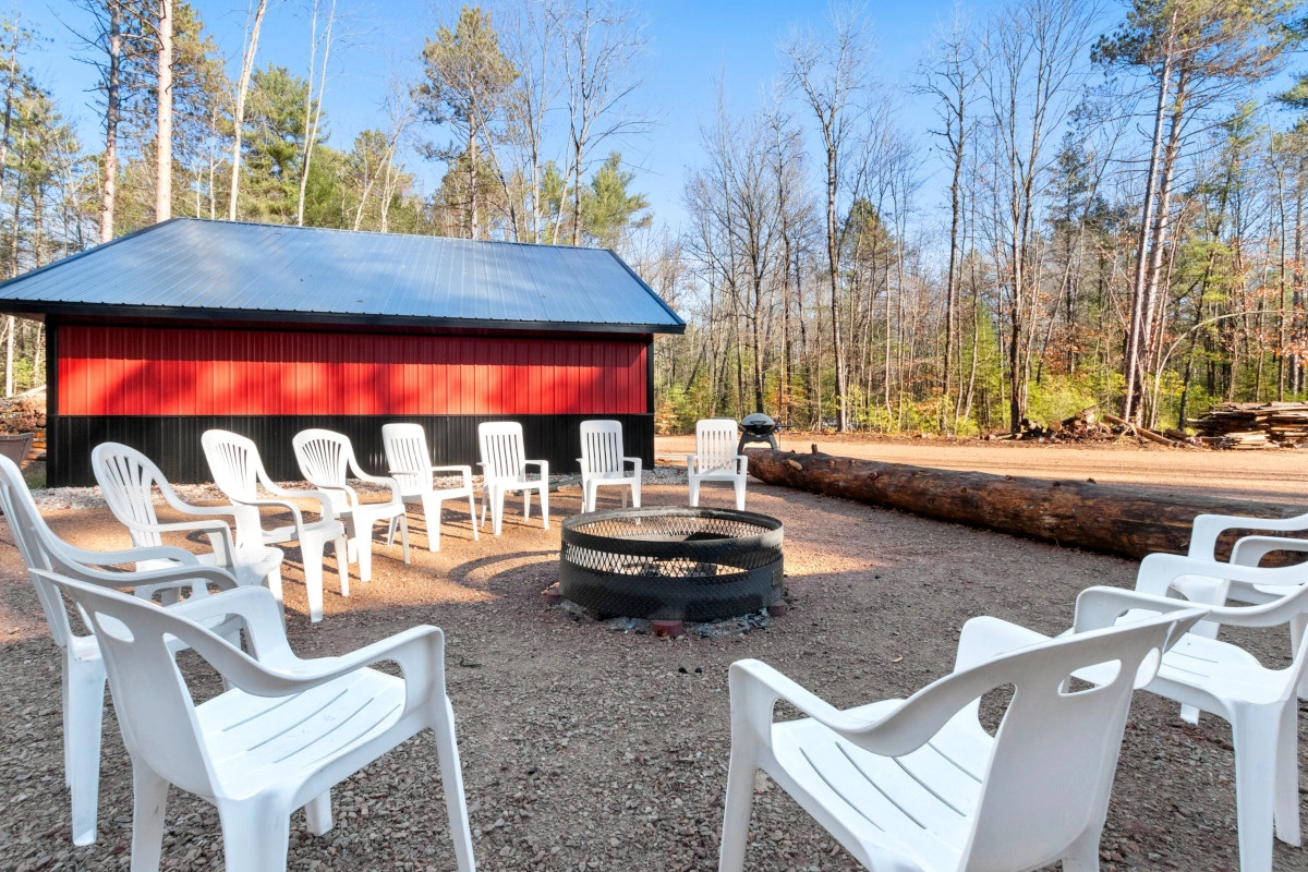 Chairs circled around fire pit