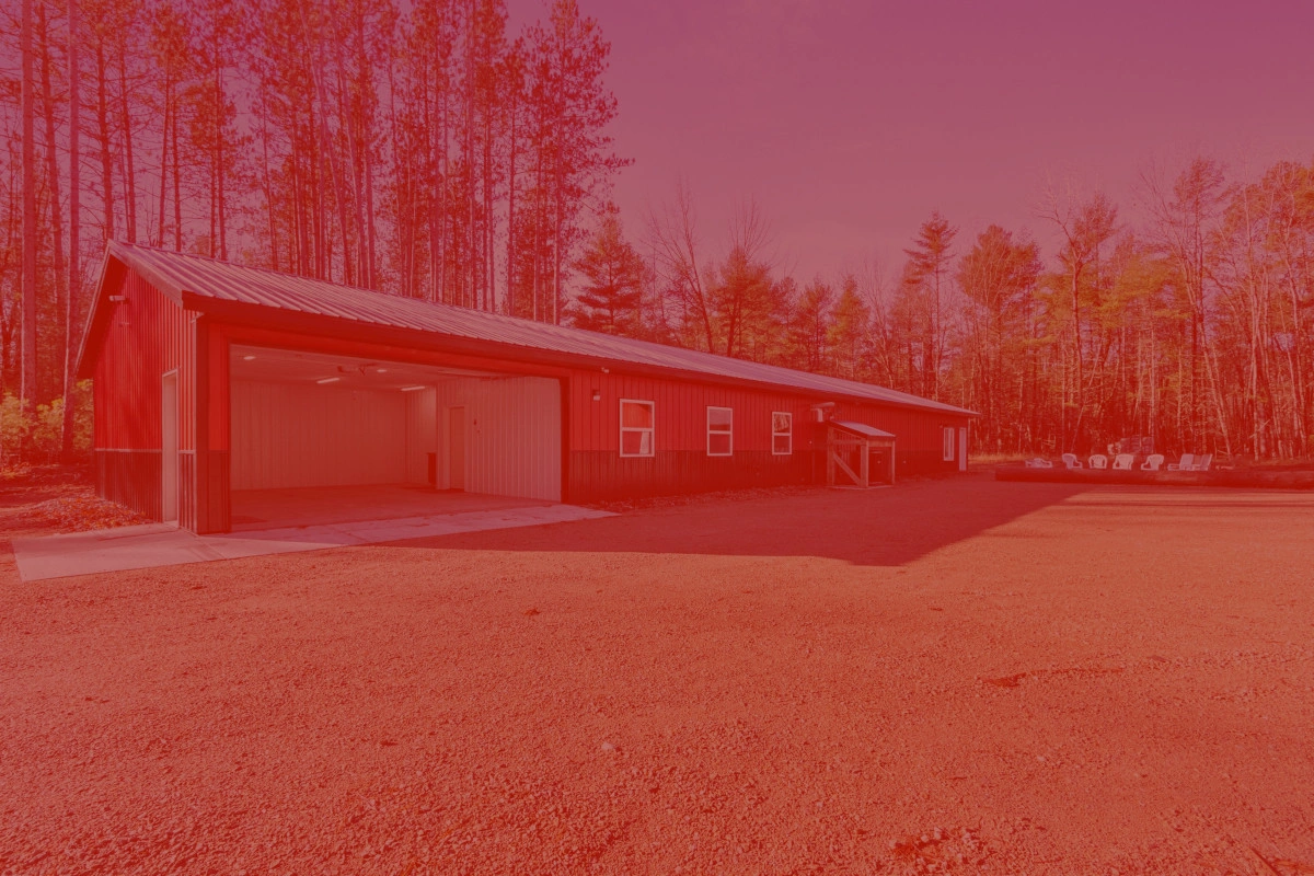 guys driving around a backroad in a UTV